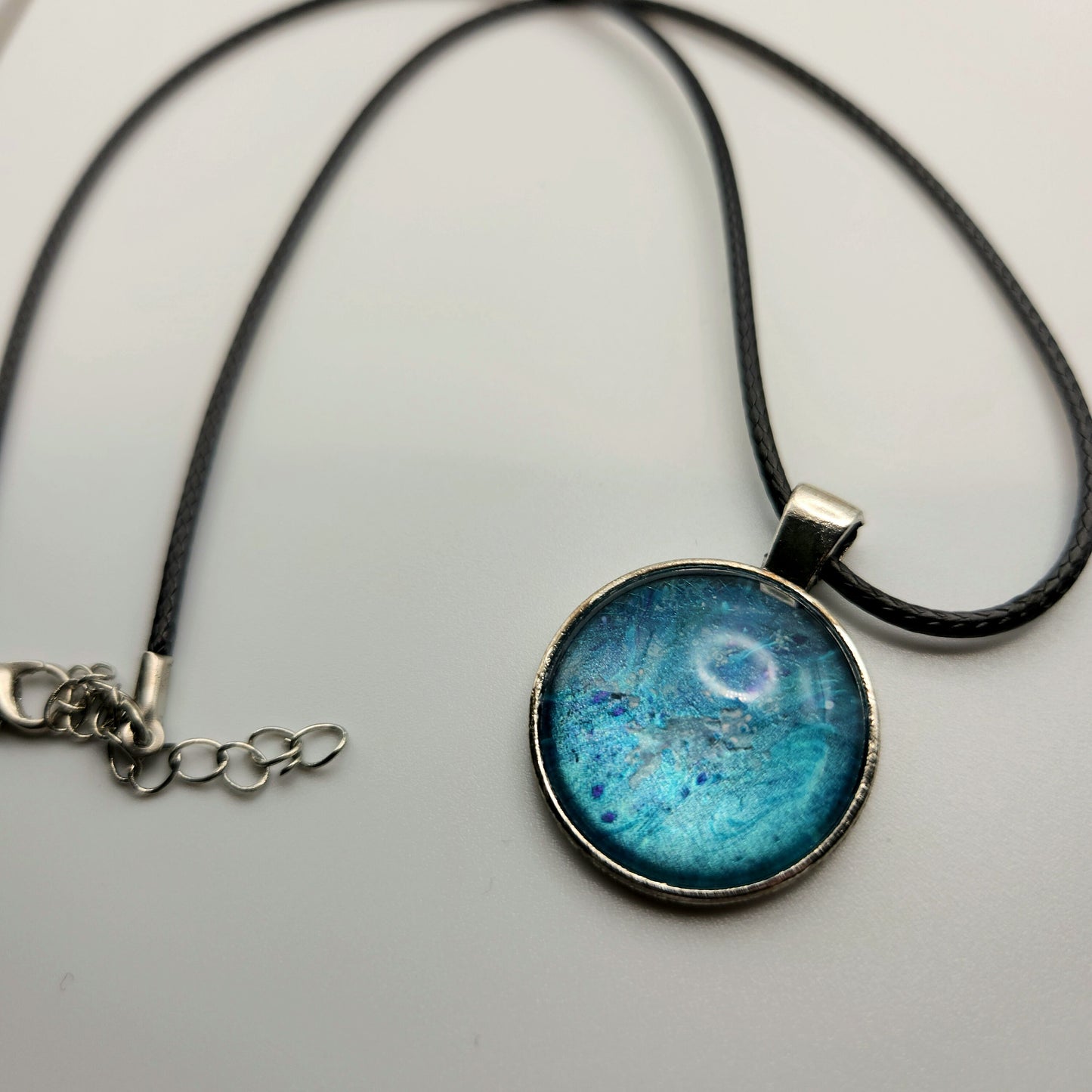 Touchstone Pendant - Silver G - Hand Painted Glass Bezel Necklace - Custom Art Jewelry - Metallic Aqua Blue, Hints of Purple, Seastone